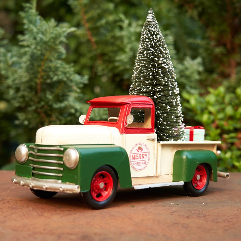 green truck with christmas tree