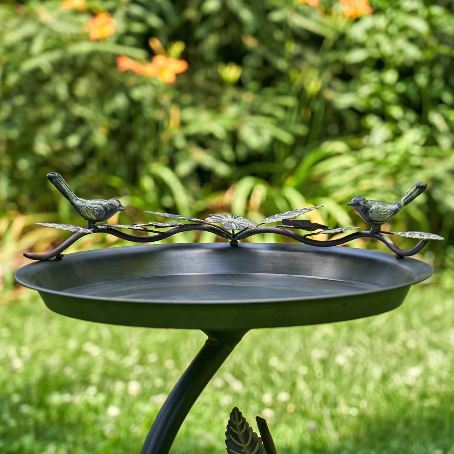 Outlets round galvanized birdbath with branch holder and bird detail